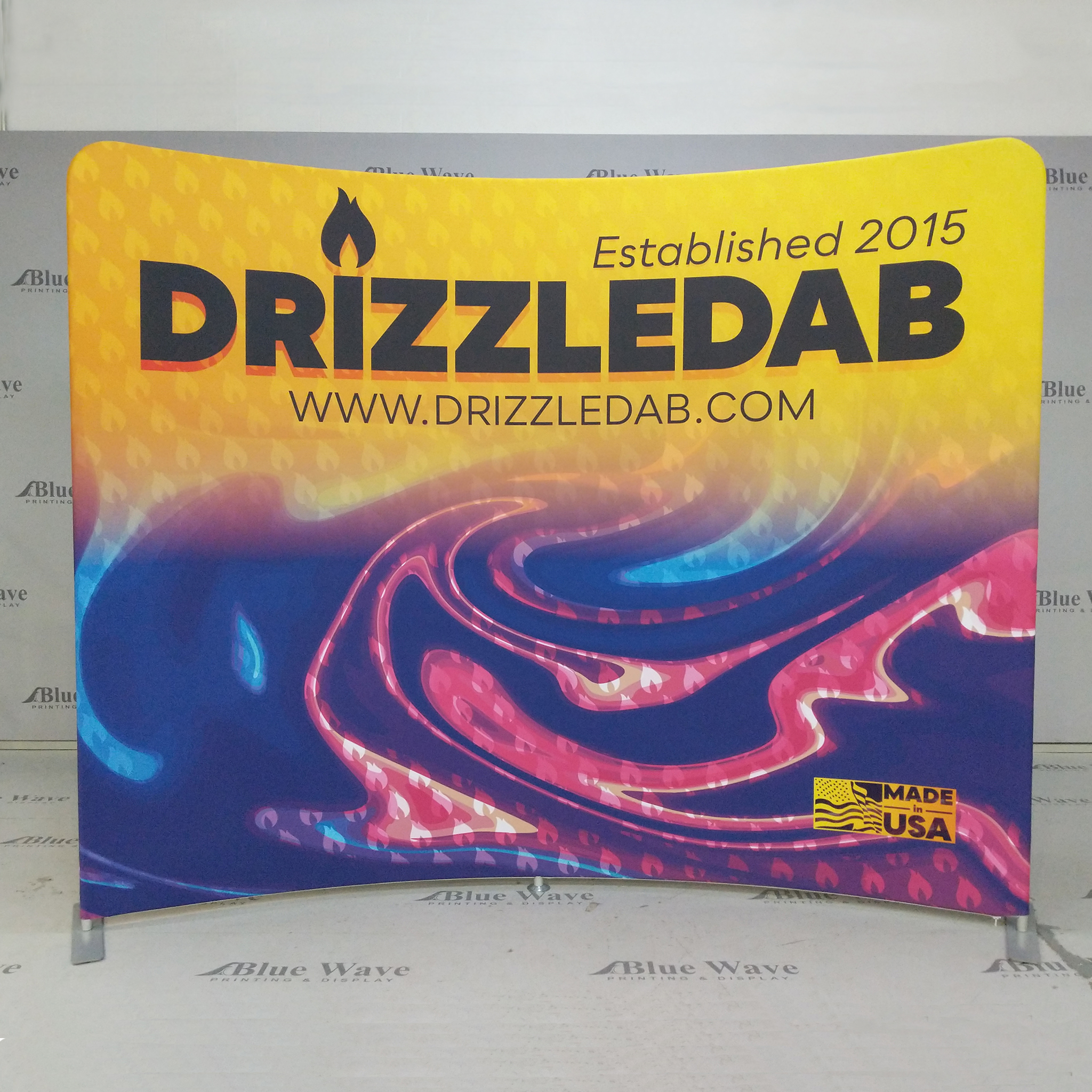 a tradeshow banner for a CBD manufacturing company called Drizzle Dab