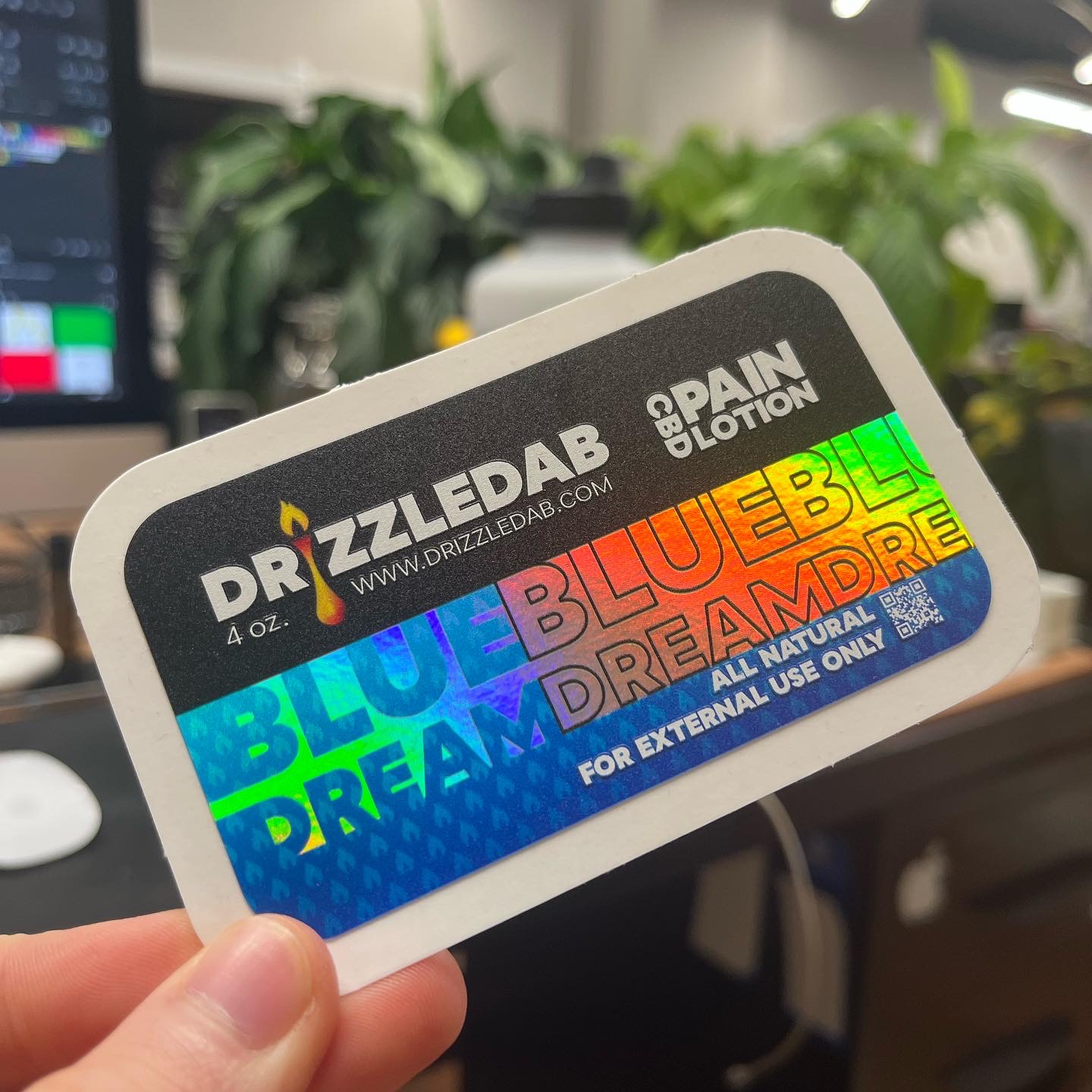 a holographic cbd label for DrizzleDab products