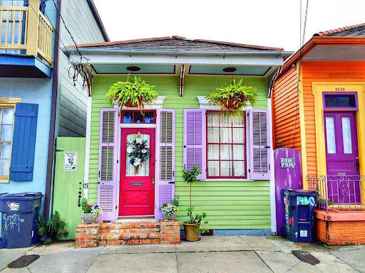 a colorful row of houses in the Faubourg Marigny
